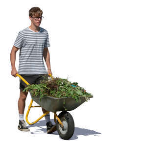 young man pushing a garden cartwheel