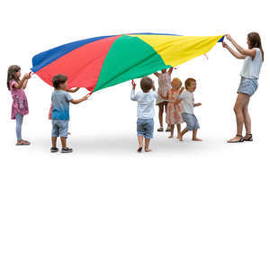 group of children playing with parachute