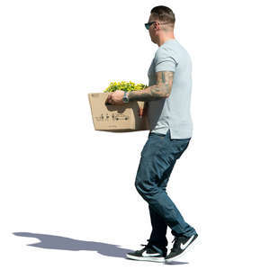 man carrying a box of plants