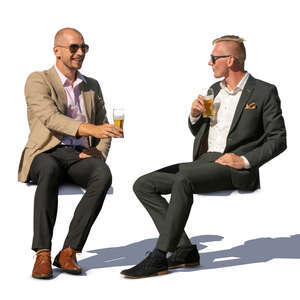 two men sitting and drinking beer