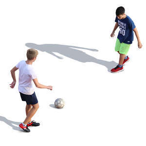 two boys playing football seen from above