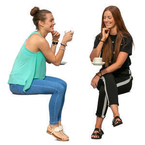 two women drinking coffee and talking