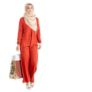 muslim woman in a red abaya shopping