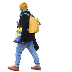 man with many colorful bags walking