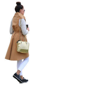 woman in light coat walking