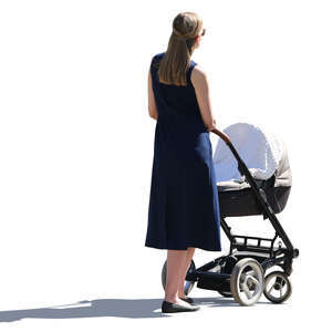 backlit woman with a baby carriage