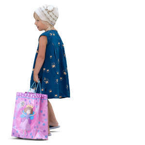 little girl with a gift bag standing