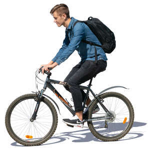 young man with a backpack riding a bike