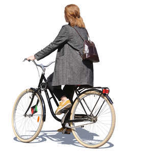 woman in a grey jacket riding a bicycle