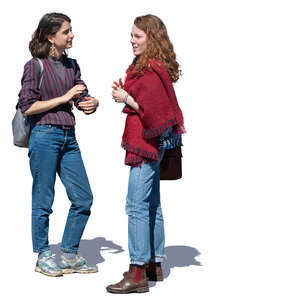 two women standing and talking