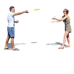 man and woman playing frisbee