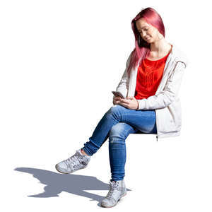 young woman with a phone sitting