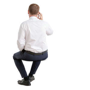 businessman sitting and talking on the phone