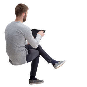 man with a tablet sitting