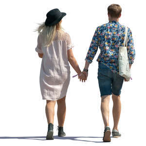 trendy couple walking hand in hand