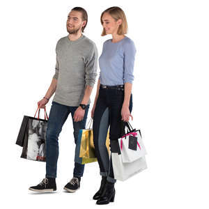 smiling man and woman with shopping bags walking