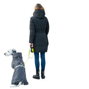 woman with a dalmatian dog standing