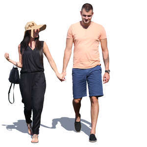 couple walking and holding hands in the summer