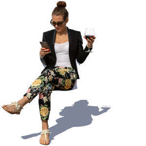 woman sitting and drinking wine