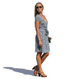 woman in a blue summer dress standing