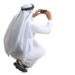 muslim man taking a picture