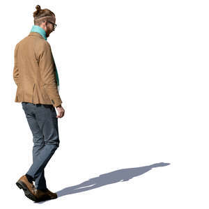 man in a light brown jacket walking