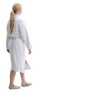 woman in a white spa bathrobe walking