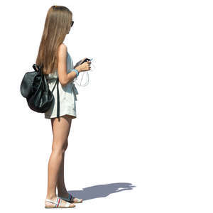 young long haired woman standing on a summer day