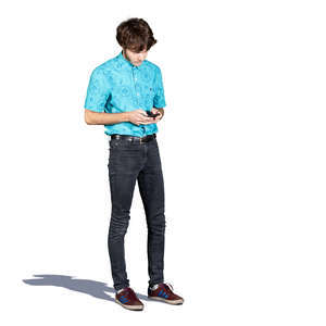 young man standing and checking his phone