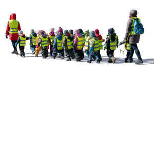 group of kindergarten children walking on the street