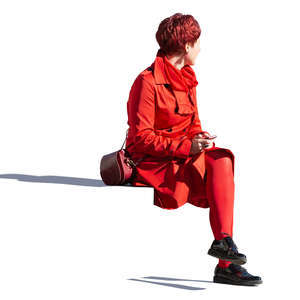 woman in a red outfit sitting