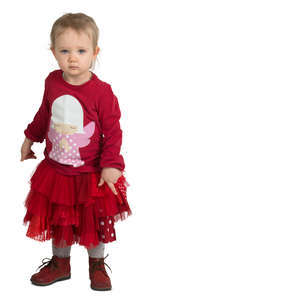 little girl in a red party dress standing