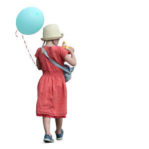 little girl with a balloon walking