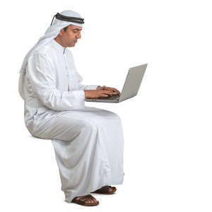 arab man sitting and working with computer