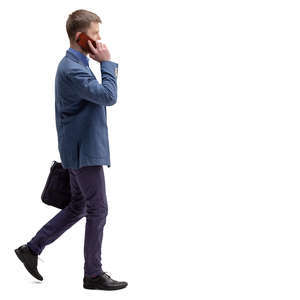 man walking and talking on the phone