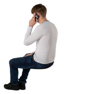 man sitting and talking on the phone