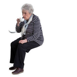 older woman sitting in a cafe