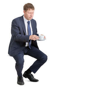 businessman sitting and drinking coffee