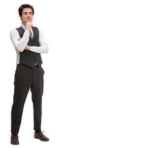 pensive man in a formal suit standing