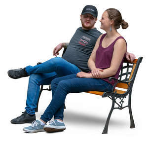 couple sitting on a bench and talking