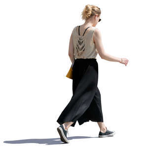 woman in a black skirt walking