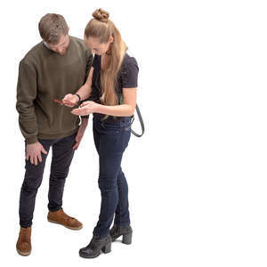 man and woman looking at a phone and talking