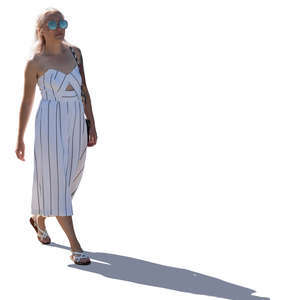 backlit woman walking