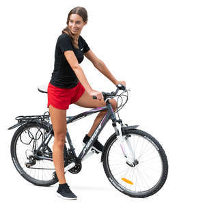 smiling woman riding a bike