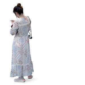 asian woman in a long summer dress standing