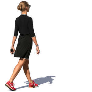 woman in a black summer dress walking