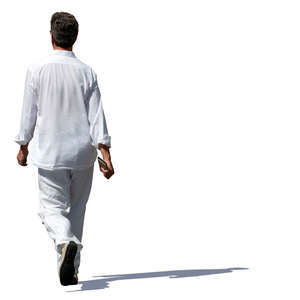 man in a white outfit walking