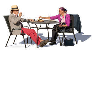 older couple sitting in a cafe