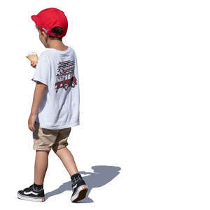 little boy with a red hat eating ice cream