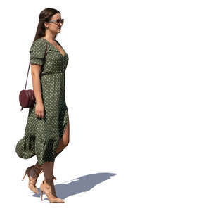 woman in a green dress walking